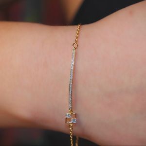 Gold Bracelet with Small Pendant